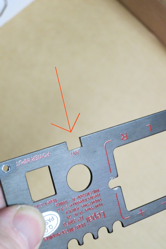 A notch allows the new wire to exit just below the antenna post