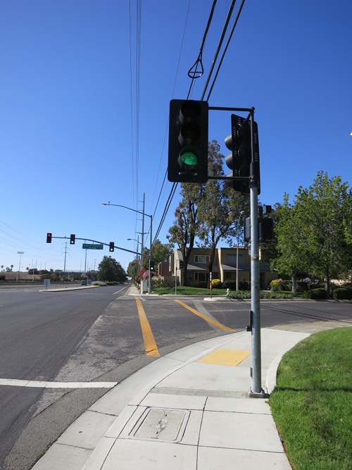 Traffic signal, southeast corner of Lafayette Street and Calle de Primavera