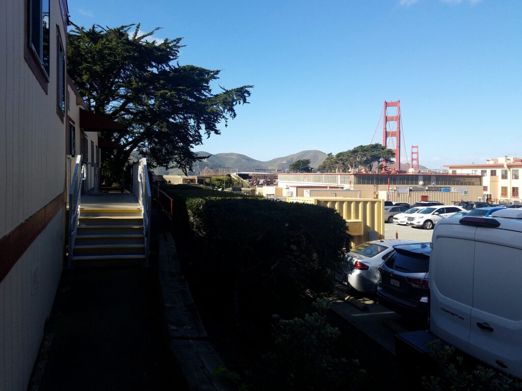 View of the Golden Gate Bridge from among the maintenance sheds